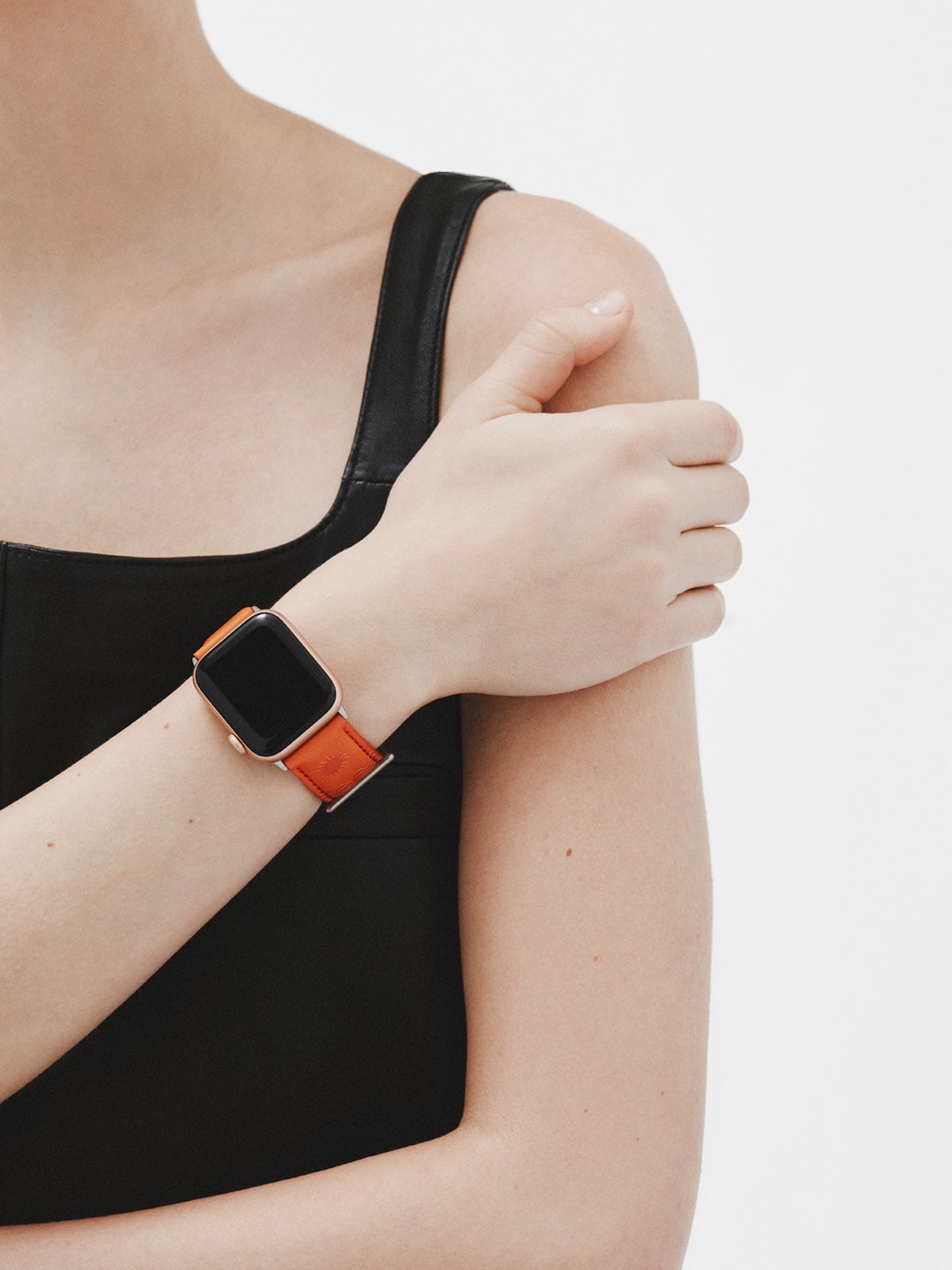 Correa para Apple Watch de cuero naranja con estampado de soles