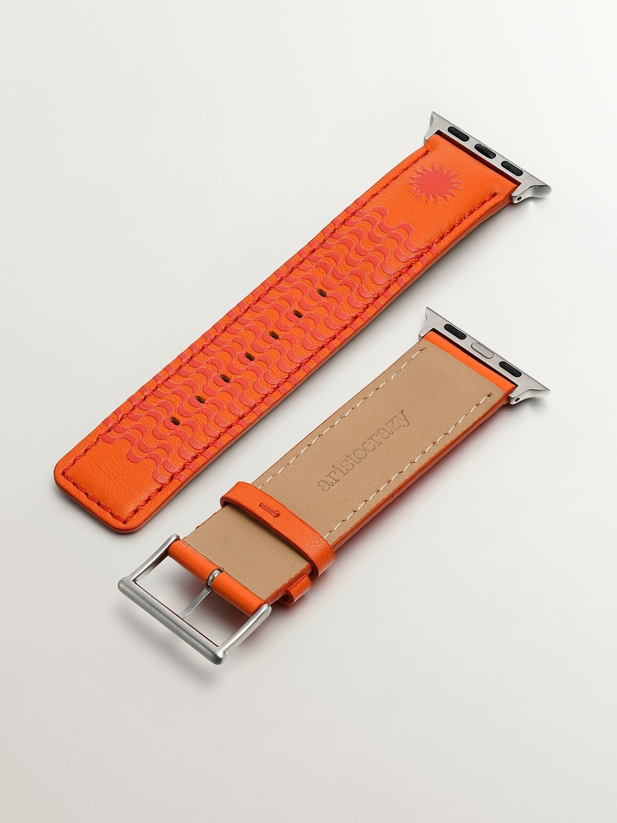 Correa para Apple Watch de cuero naranja con estampado de soles