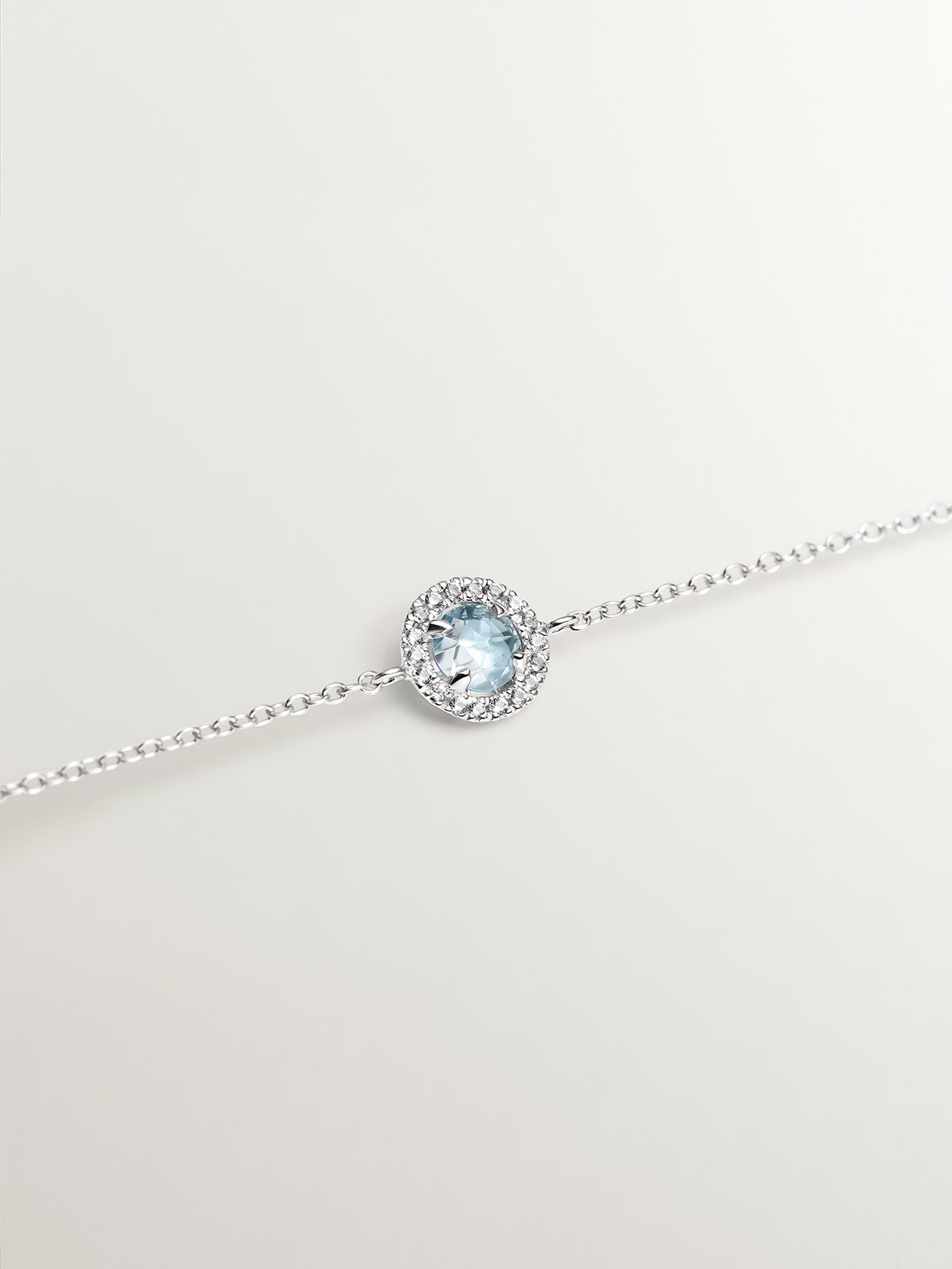 Pulsera de plata 925 con zafiros blancos y topacio azul