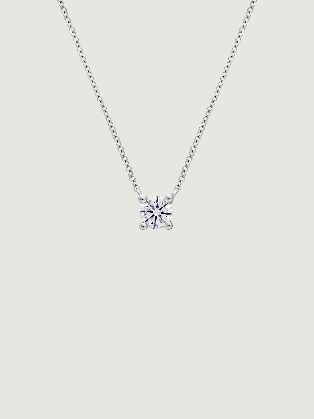 Colgante de oro blanco de 18K con diamante 0,1 cts