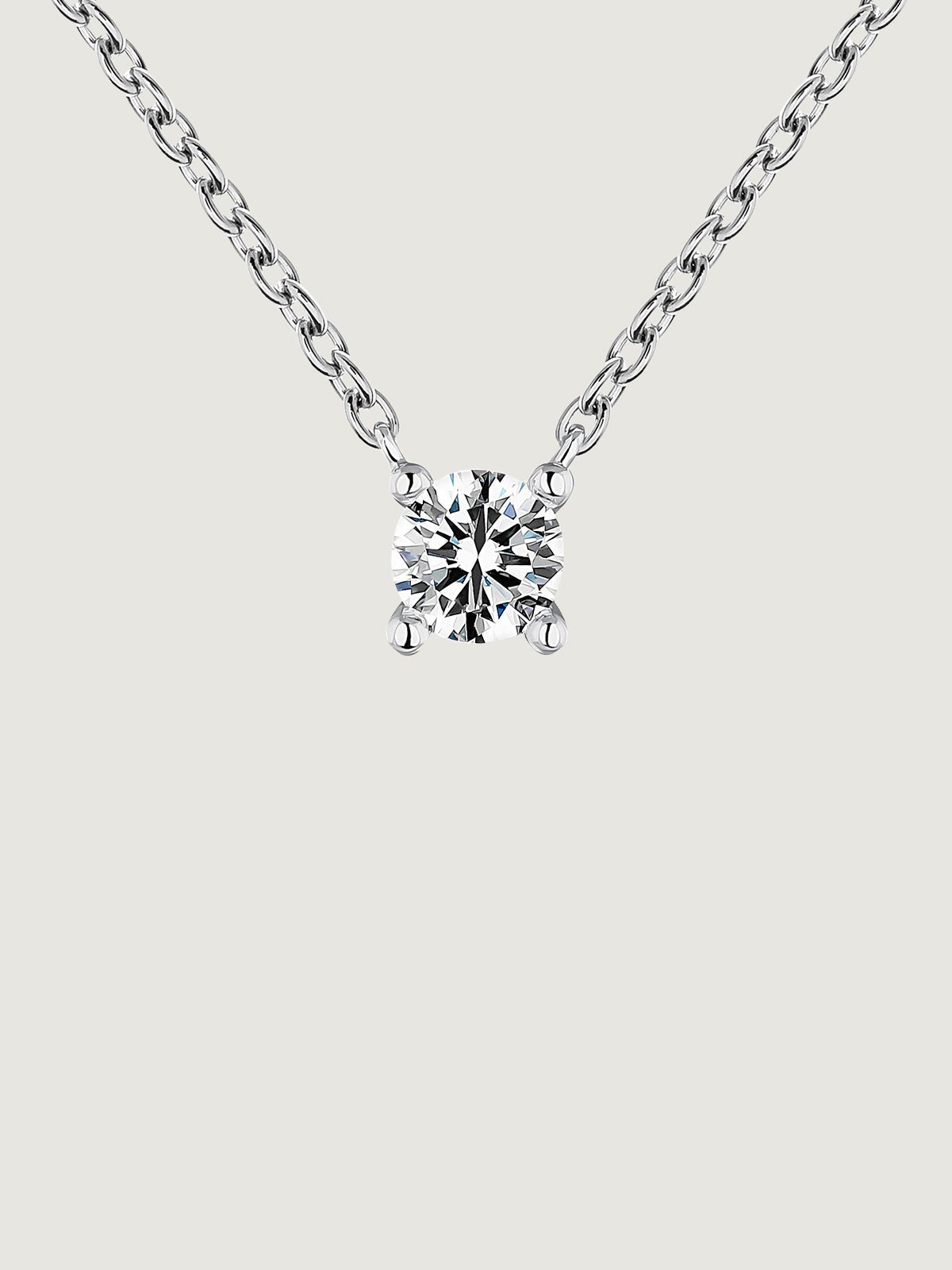 Colgante solitario de oro blanco de 18K con diamante de 0,15cts