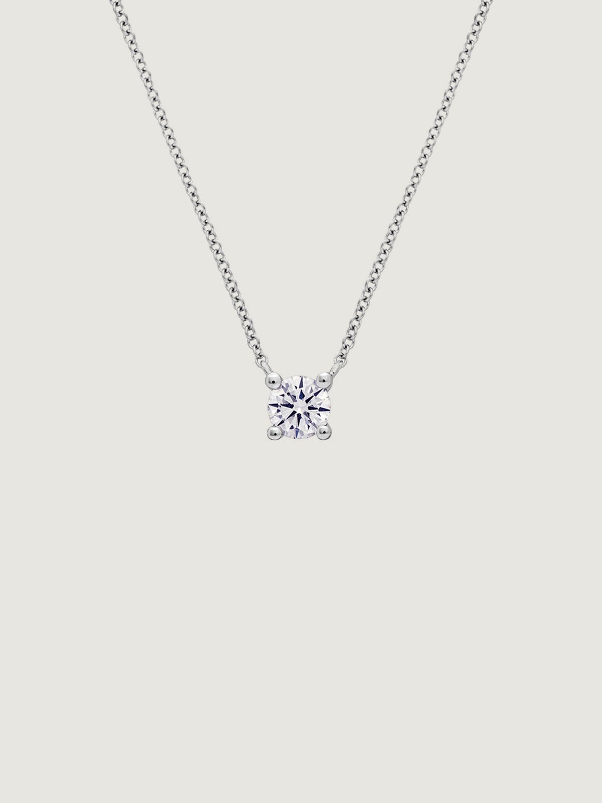 Colgante de oro blanco de 18K con diamante 0,20 cts