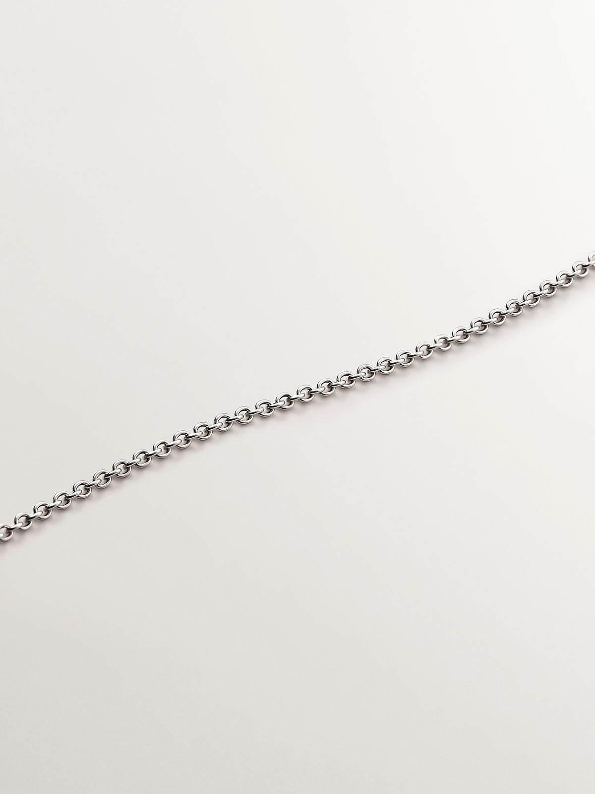 Colgante de oro blanco de 18K con infinito de diamantes