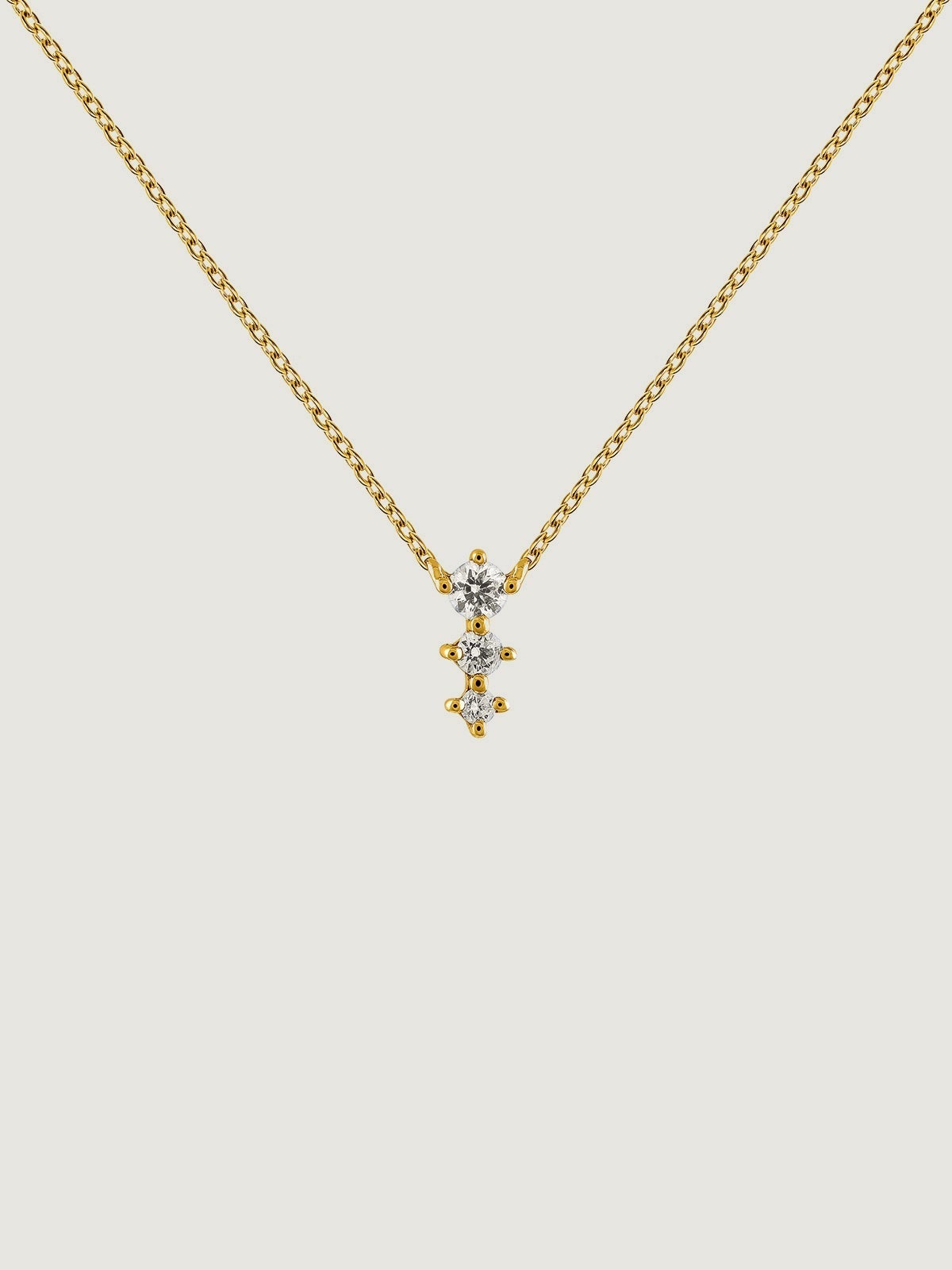 Colgante de oro amarillo de 18K con triple diamante