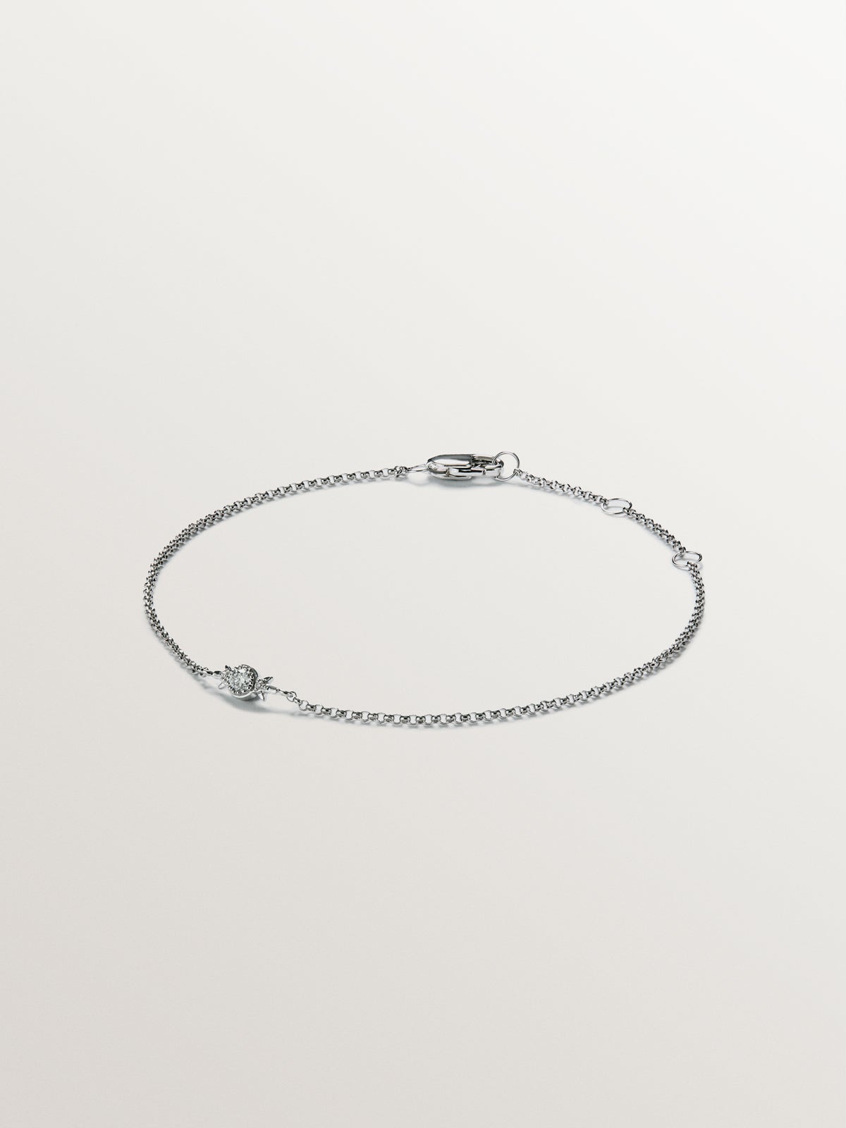 Pulsera de eslabones rolo de oro blanco de 9K con diamante