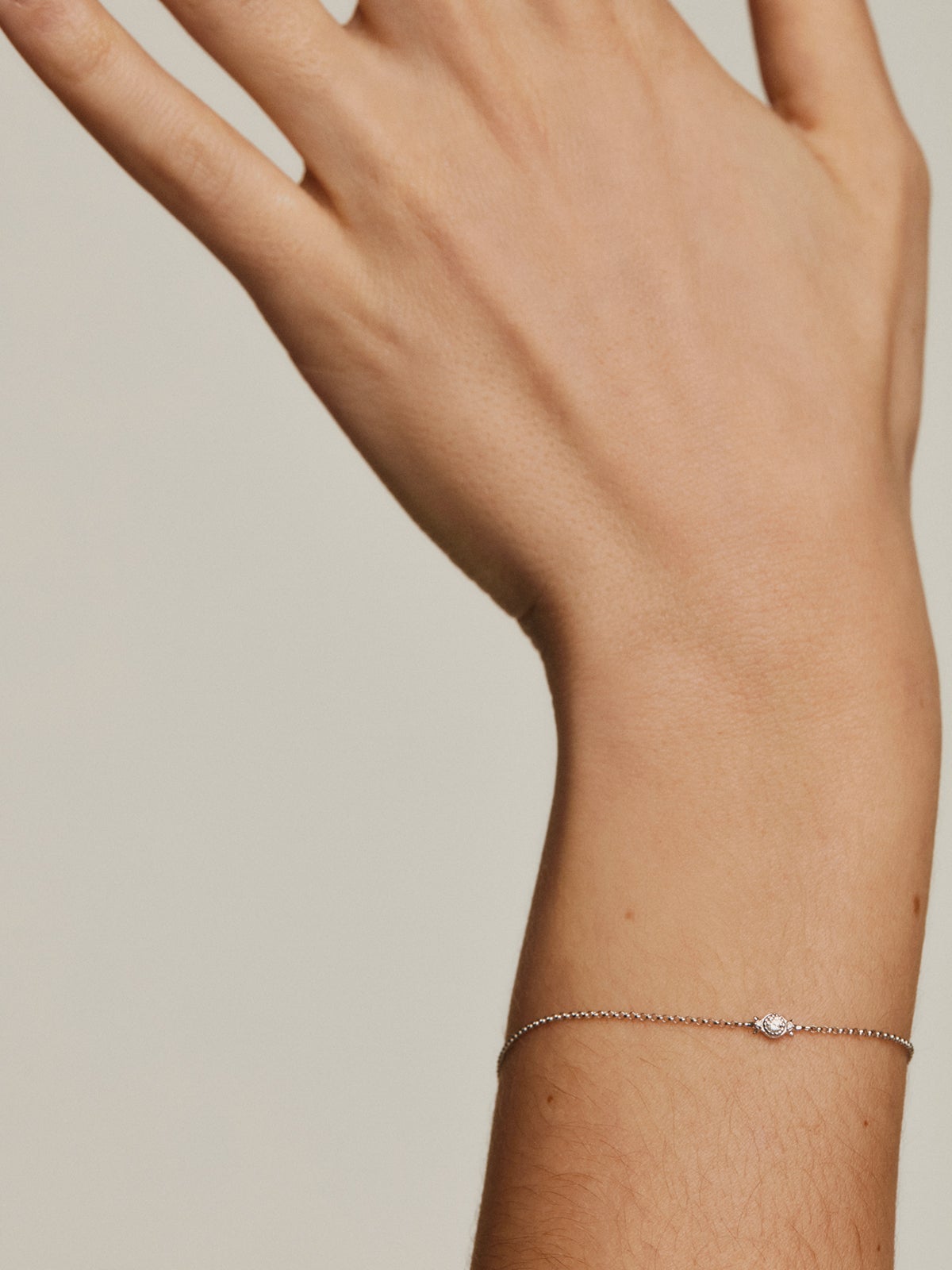 Pulsera de eslabones rolo de oro blanco de 9K con diamante