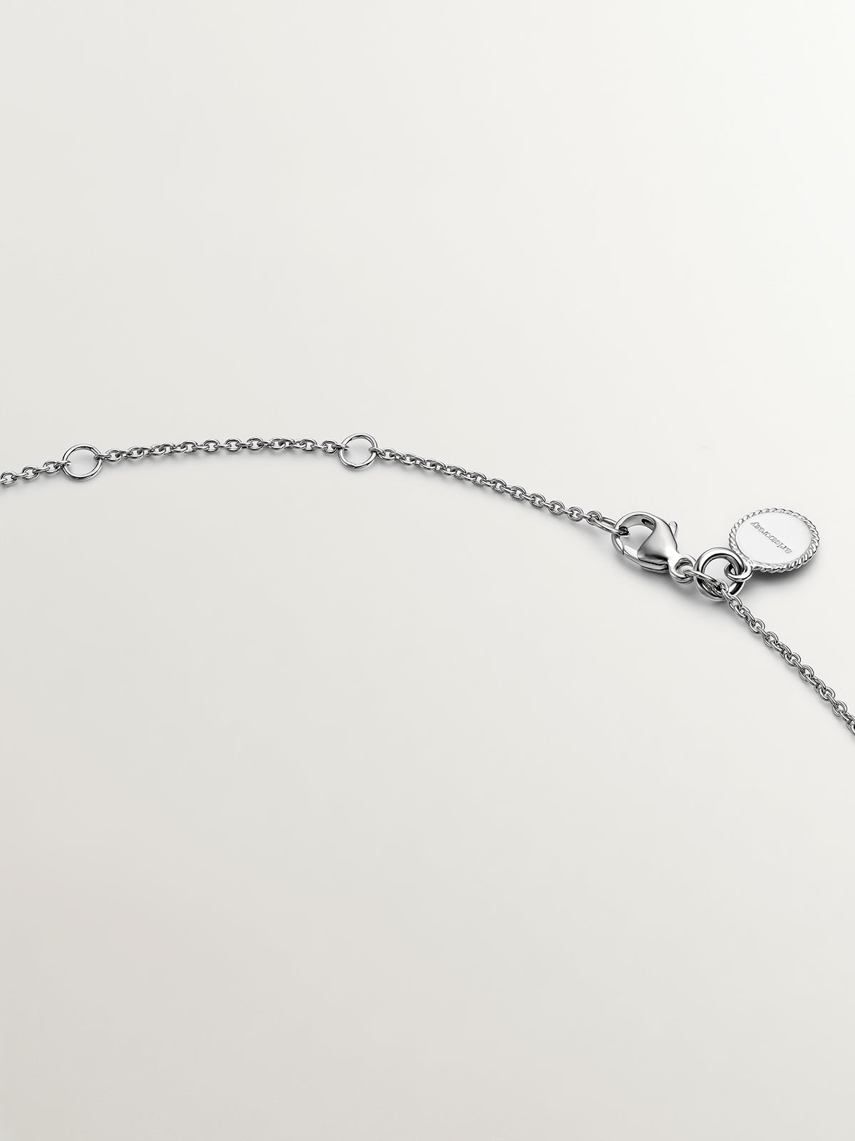 Colgante de plata 925 con círculos y topacios blancos