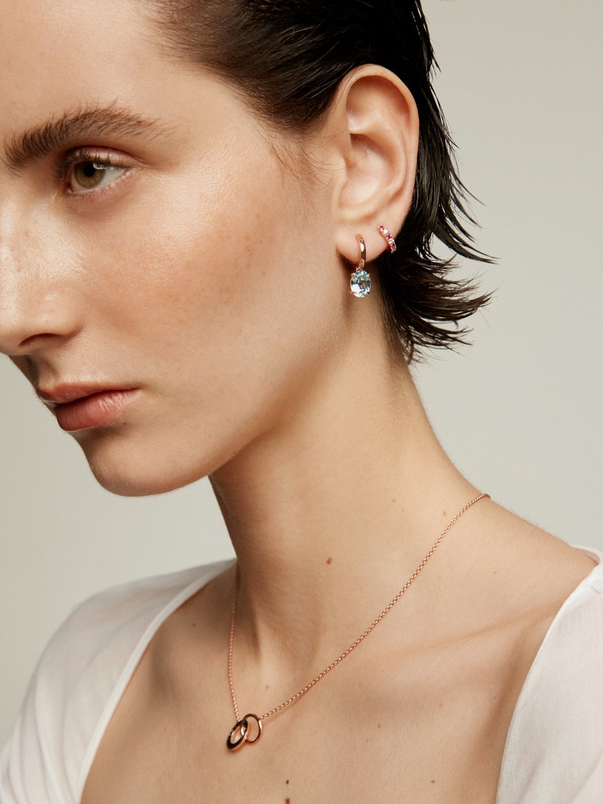 Pendientes de plata 925 bañada en oro rosa de 18K con topacio azul sky