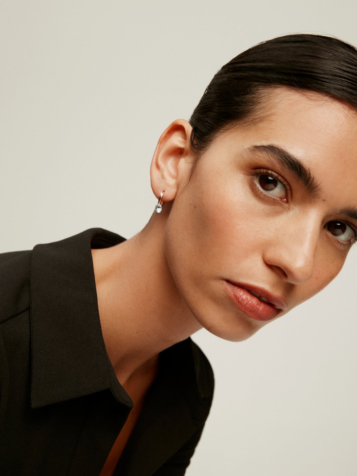 Pendientes de plata 925 bañada en oro rosa de 18K con topacio azul sky