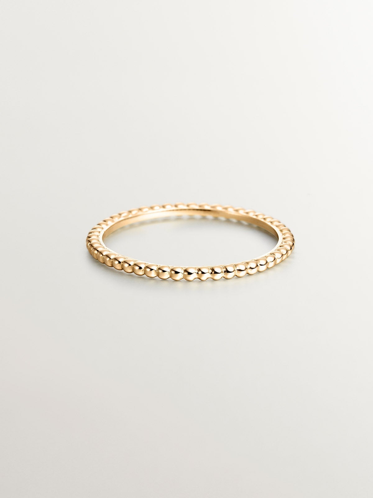 Anillo de oro amarillo de 9K con bolitas