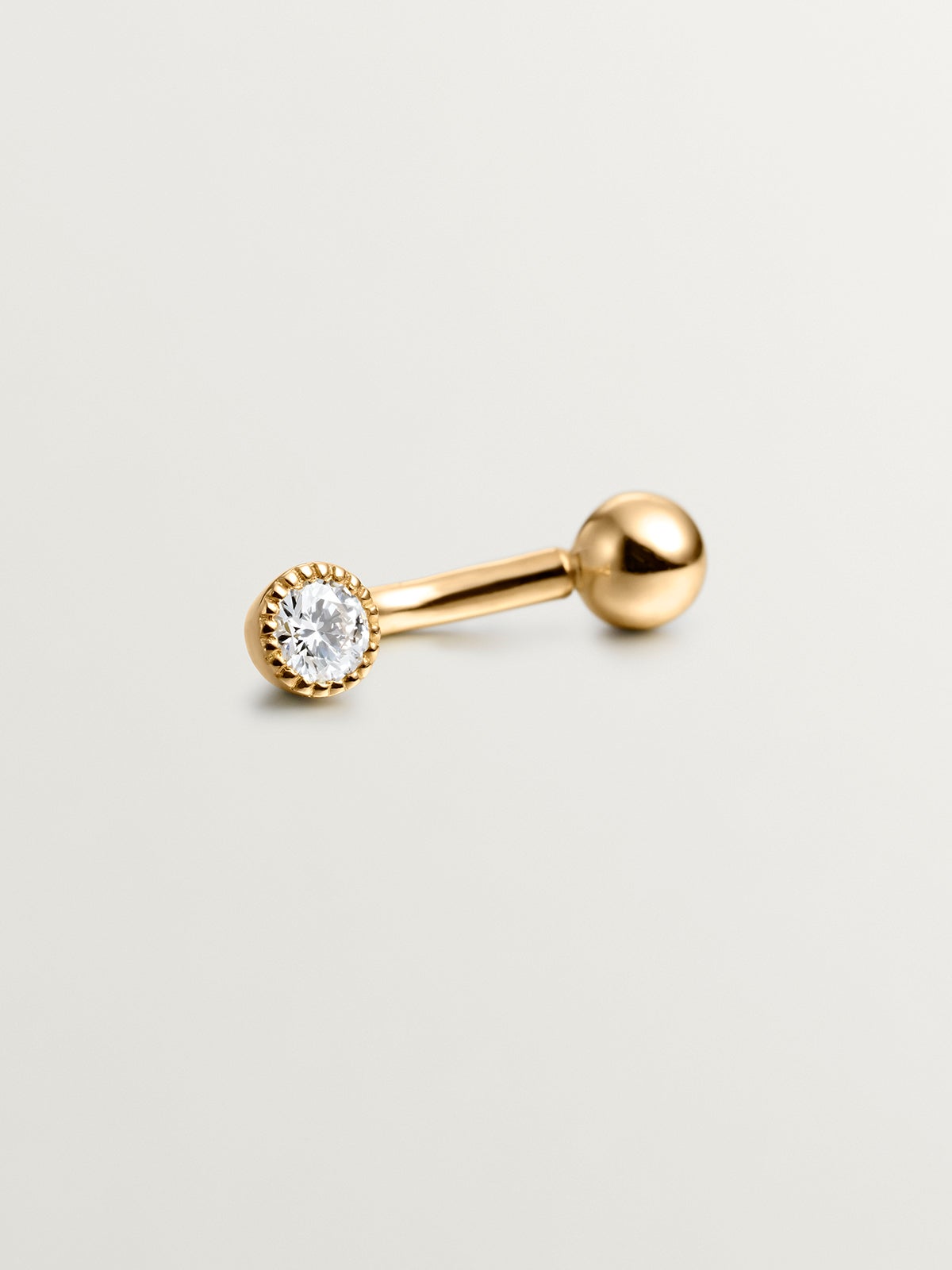 Piercing rook de oro amarillo de 18K con diamante