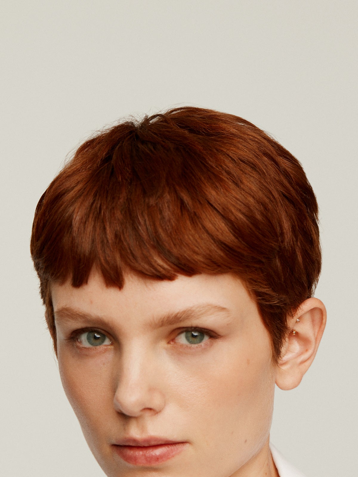 Piercing rook de oro amarillo de 18K con diamante