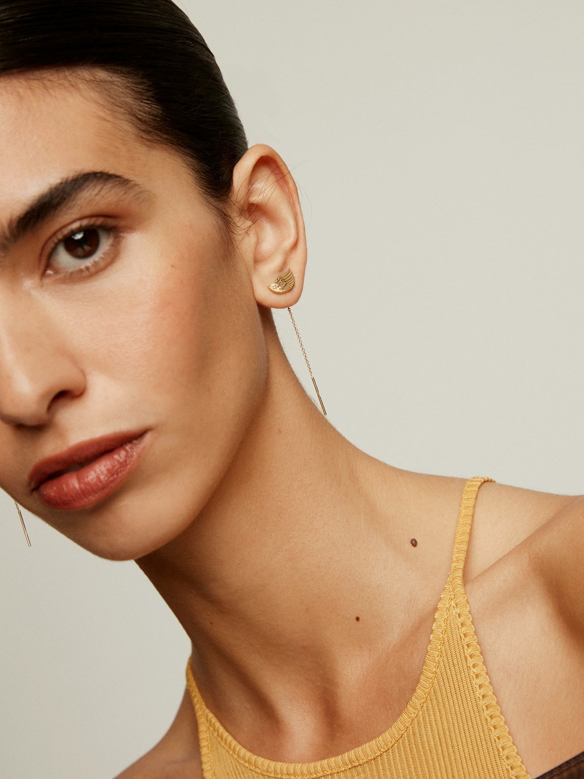 Pendientes largos de plata 925 bañada en oro amarillo de 18K con alas