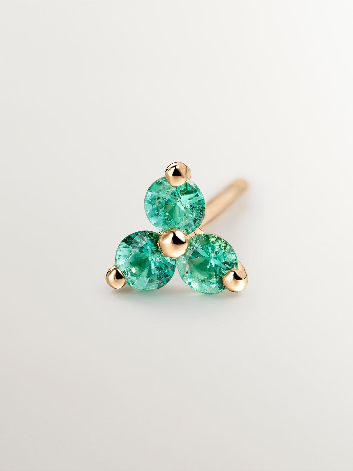 Pendiente individual de oro amarillo de 9K con trébol de esmeraldas