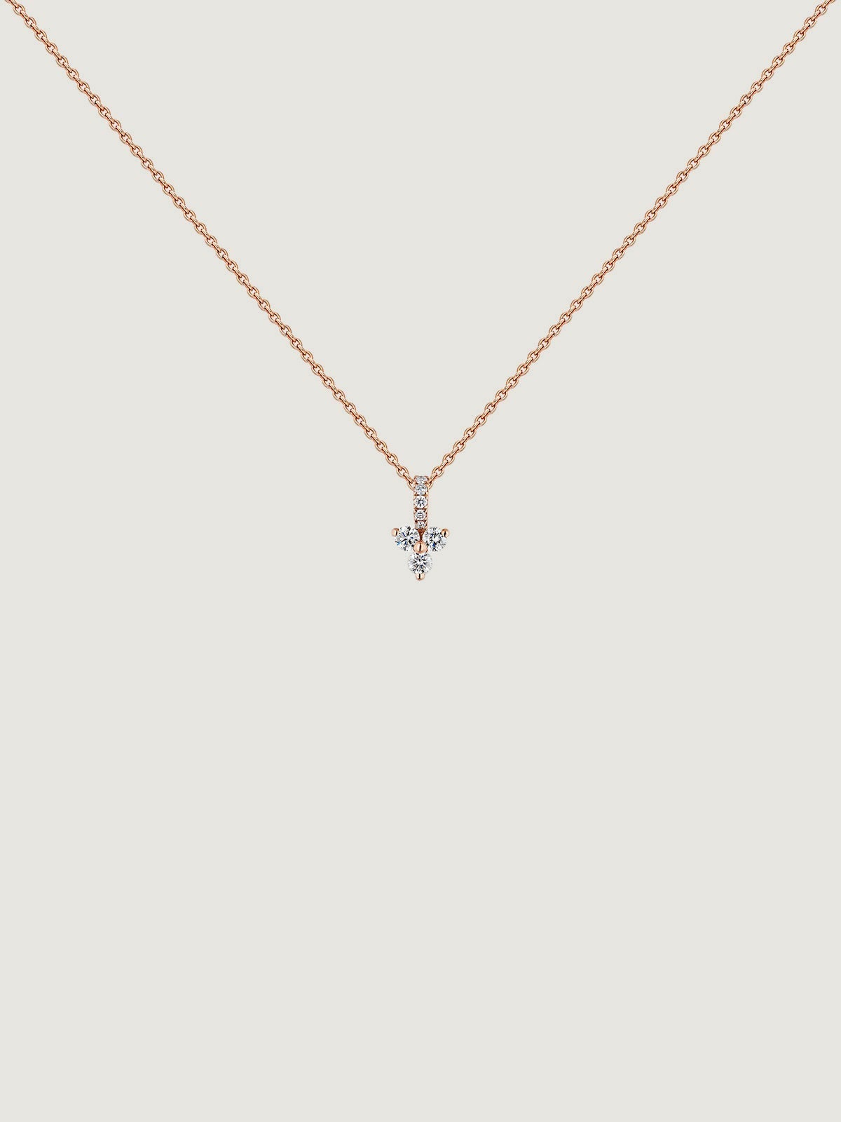 Colgante de oro rosa de 18K con cruz de diamantes 0,09 cts