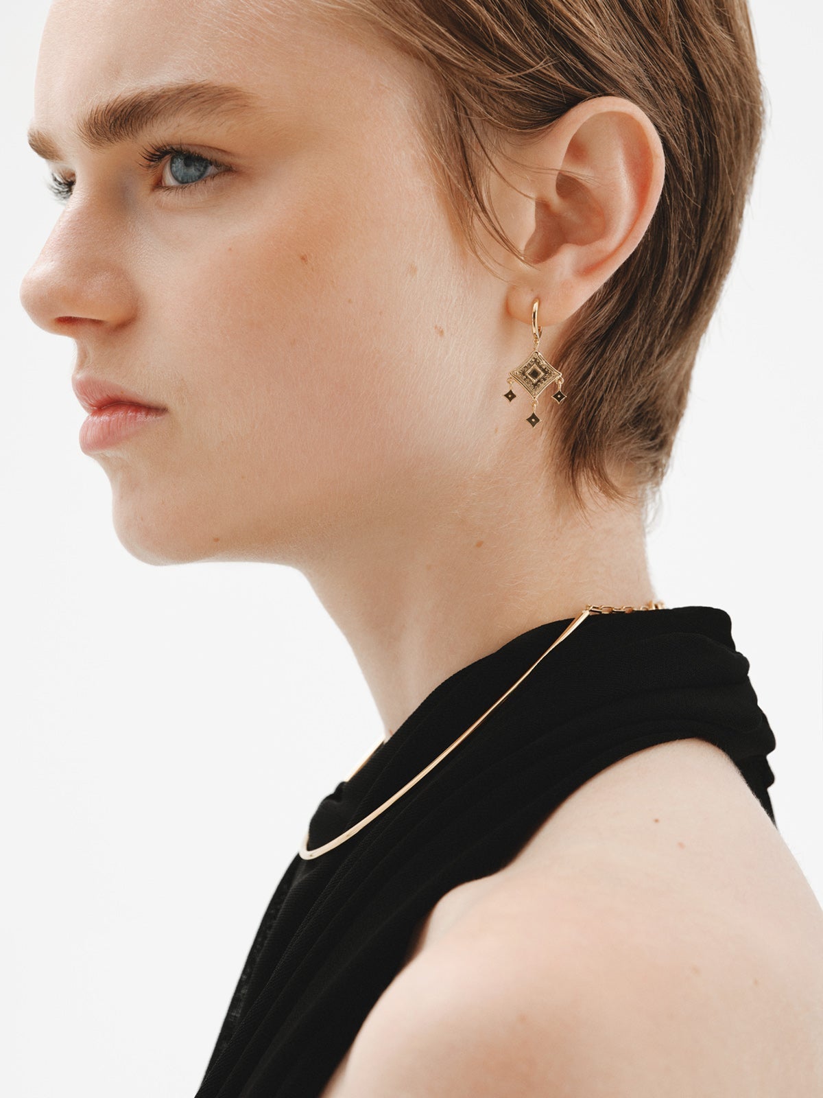 Pendientes de aro de plata 925 bañada en oro amarillo de 18K con motivos étnicos