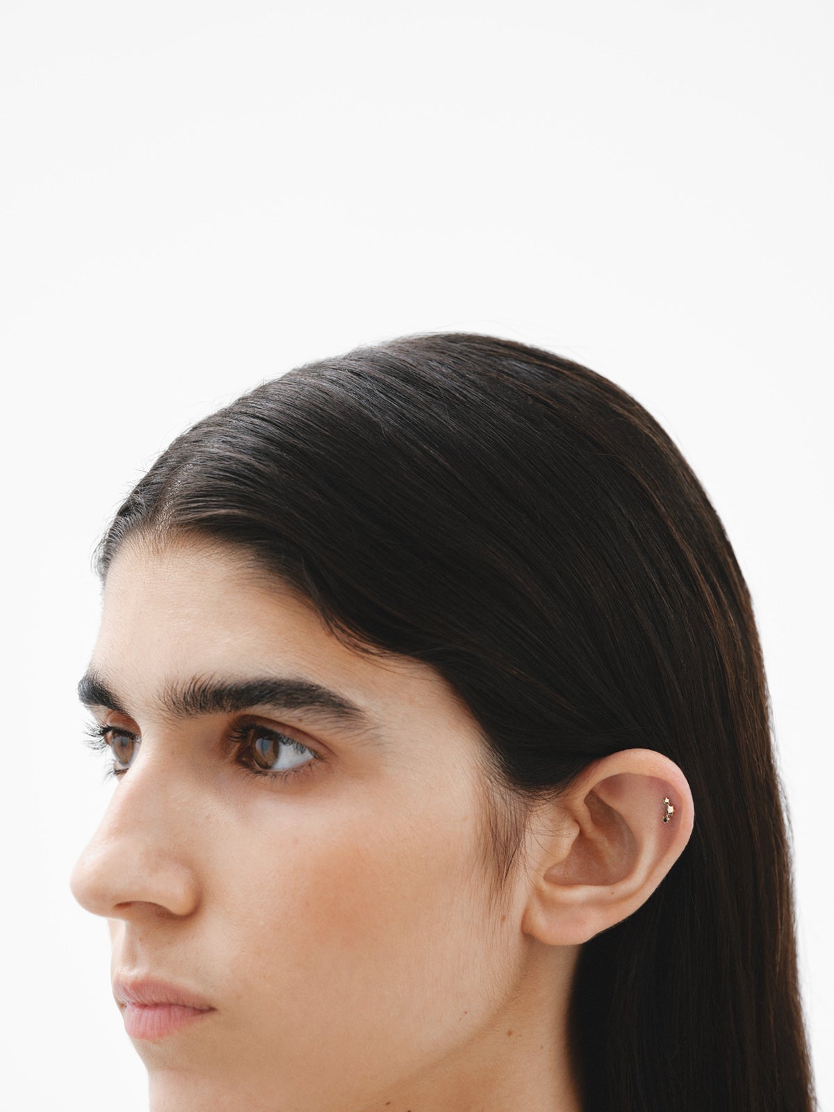 Pendiente individual de oro amarillo de 9K con estrellas