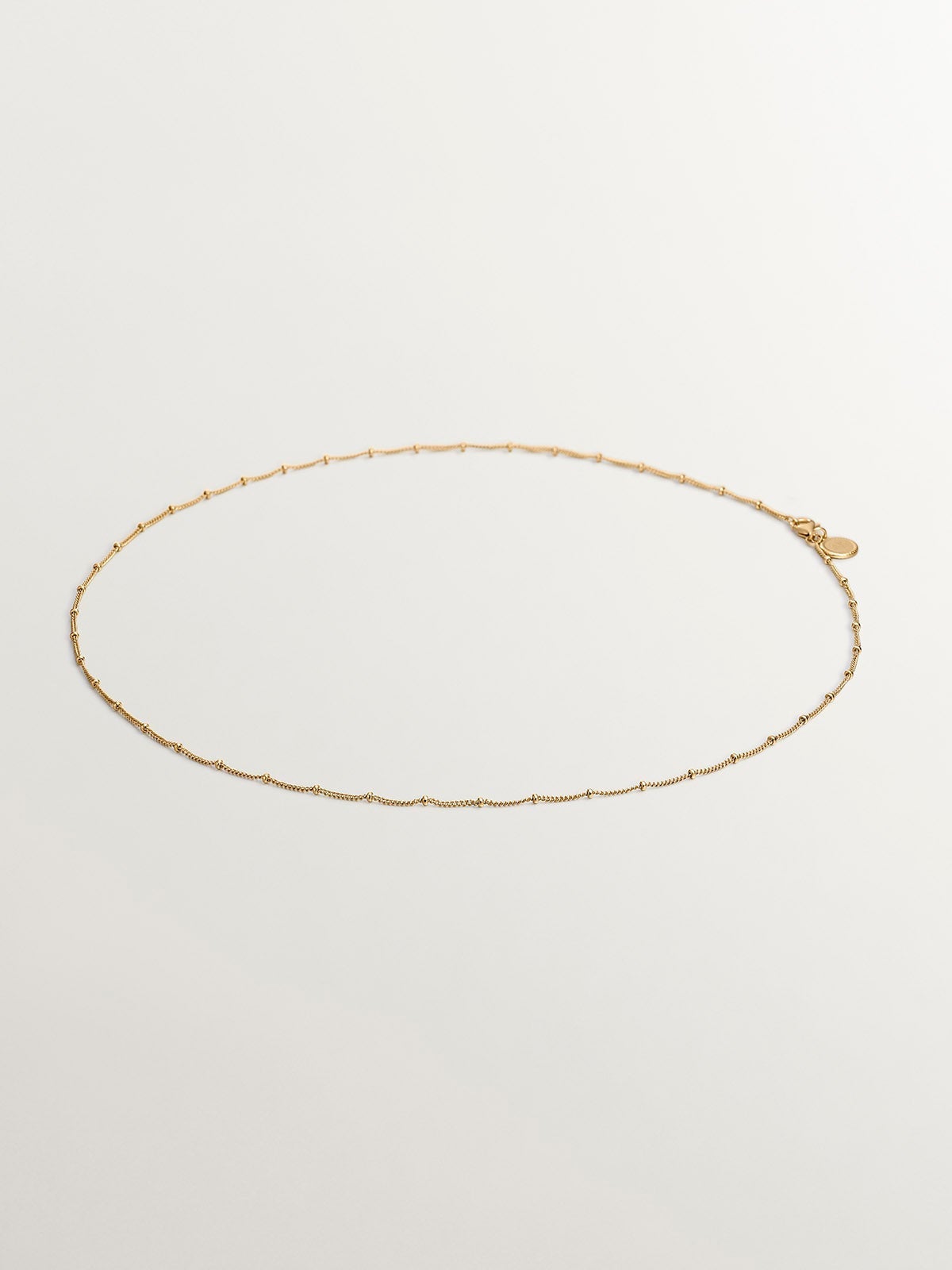 Cadena de plata 925 bañada en oro amarillo de 18K con bolitas