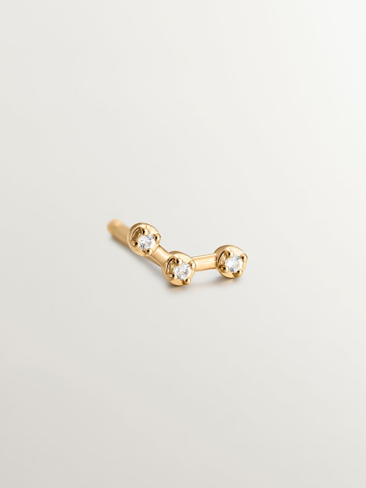 Pendiente individual trepador de plata 925 bañada en oro amarillo de 18K con topacios blancos