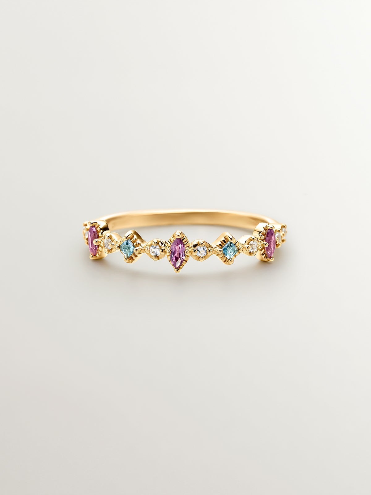 Anillo de plata 925 bañada en oro amarillo de 18K con topacios y rodolitas