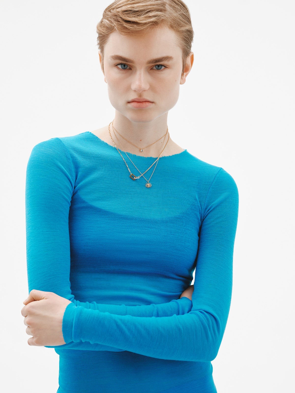 Colgante de plata 925 bañada en oro amarillo de 18K con topacio azul sky