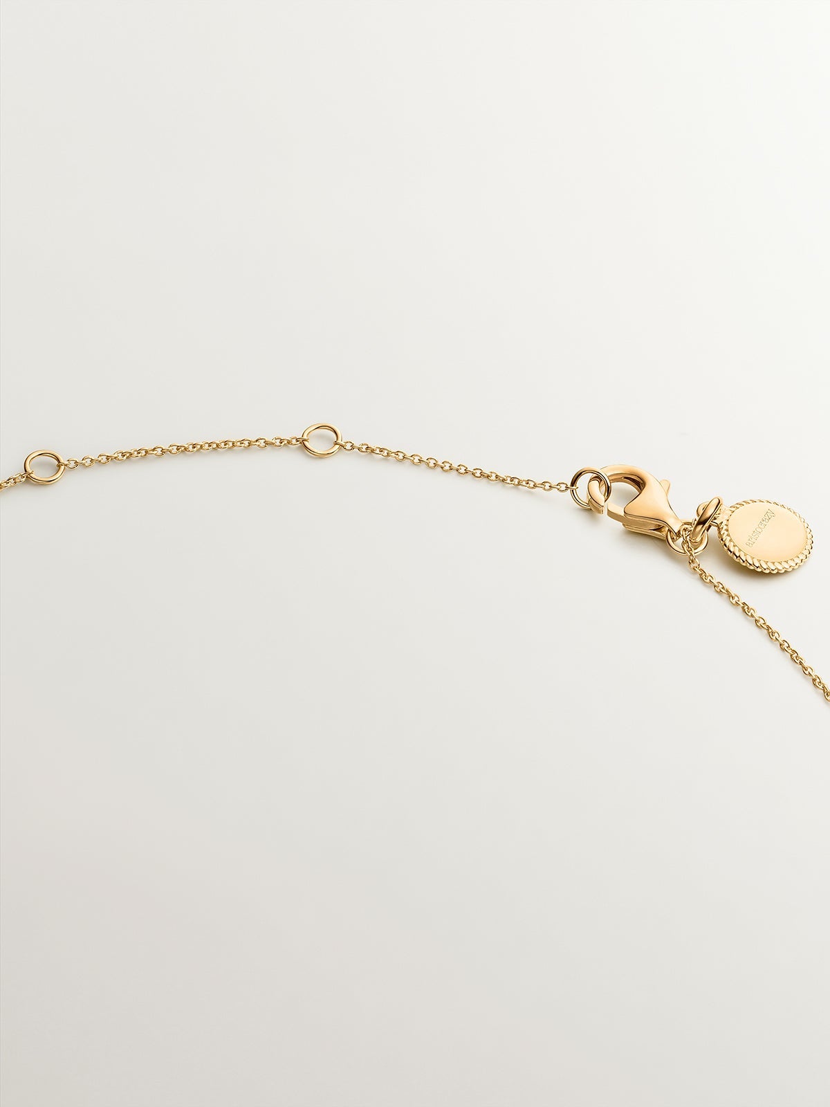 Collar de plata 925 bañada en oro amarillo de 18K con rodolitas y topacios