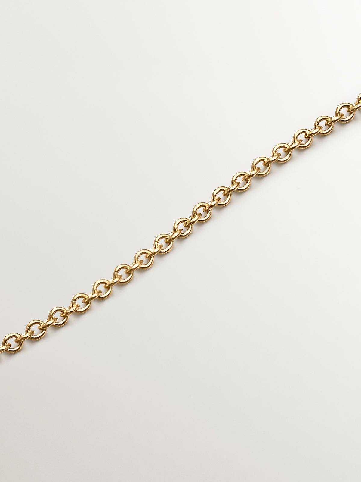 Colgante de plata 925 bañada en oro amarillo de 18K con topacio azul sky y zafiros blancos