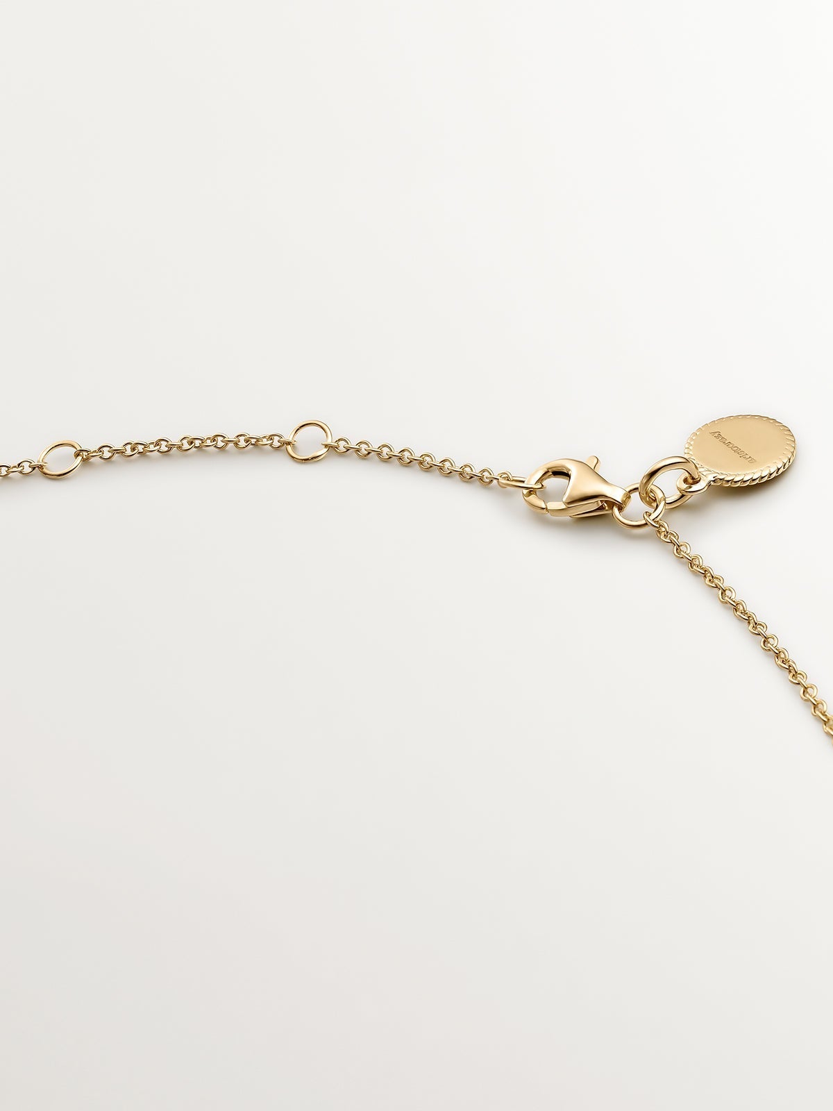 Colgante de plata 925 bañada en oro amarillo de 18K con topacio azul sky y zafiros blancos