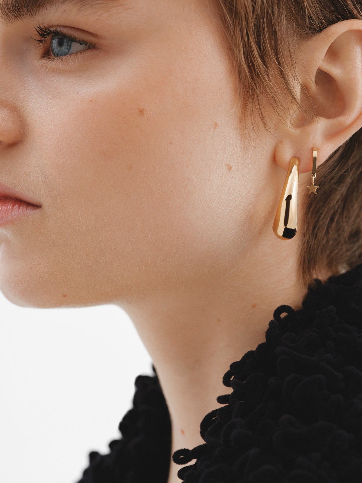 Pendientes de aro pequeños de plata 925 bañada en oro amarillo de 18K con estrella