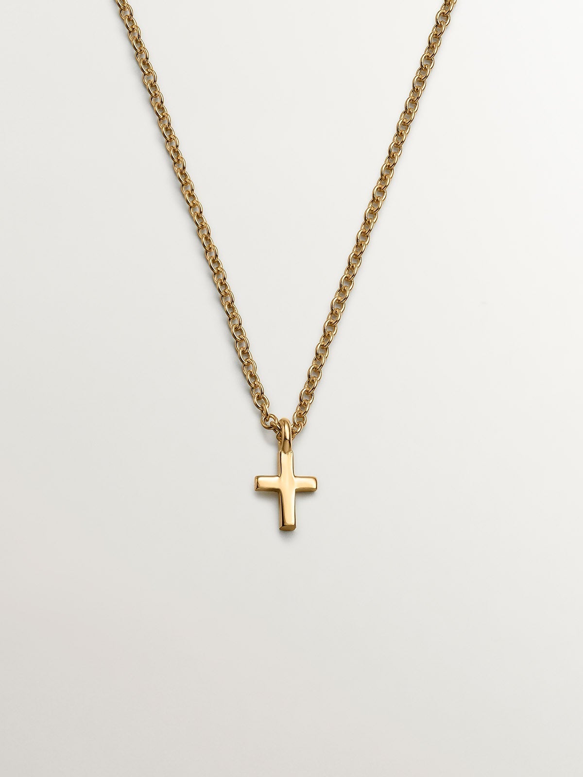 Colgante de plata 925 bañada en oro amarillo de 18K con cruz