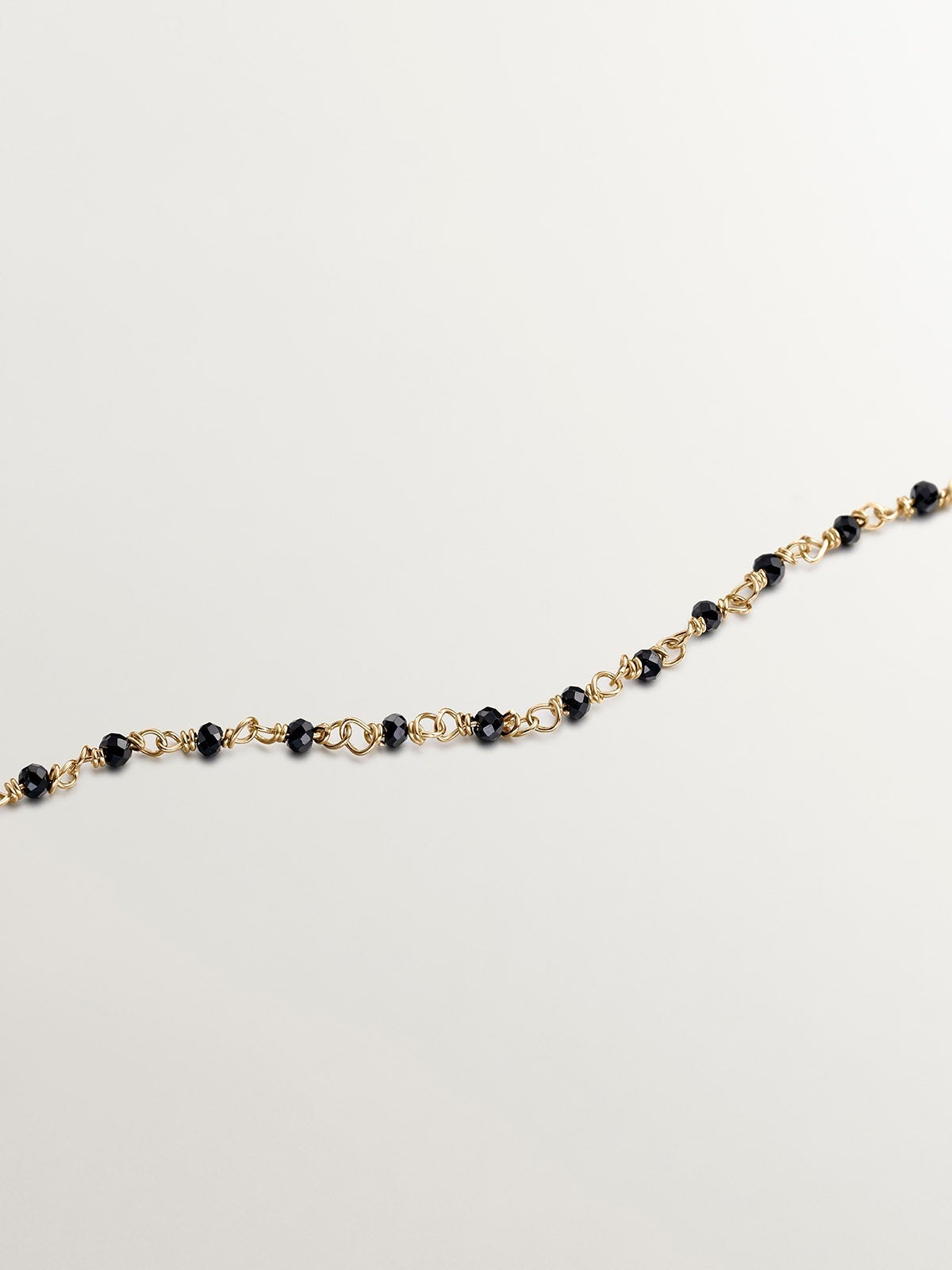 Cadena de plata 925 bañada en oro amarillo 18K con espinelas negras