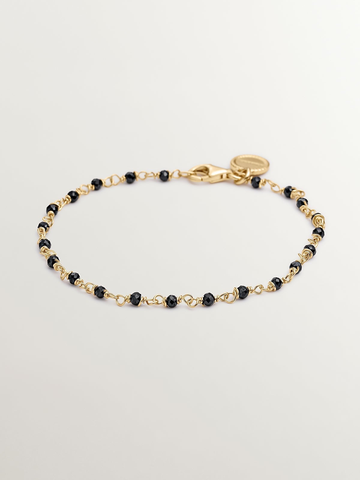 Pulsera de plata 925 bañada en oro amarillo de 18K con espinela negra