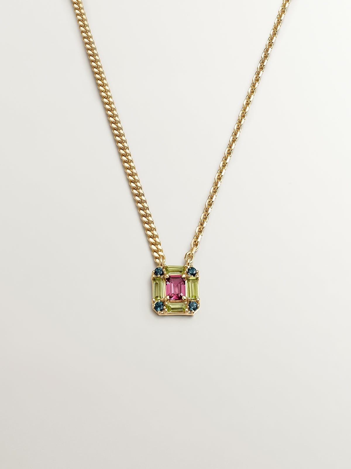 Colgante de plata 925 bañada en oro amarillo de 18K con rodolita rosa, topacio azul london y peridoto verde