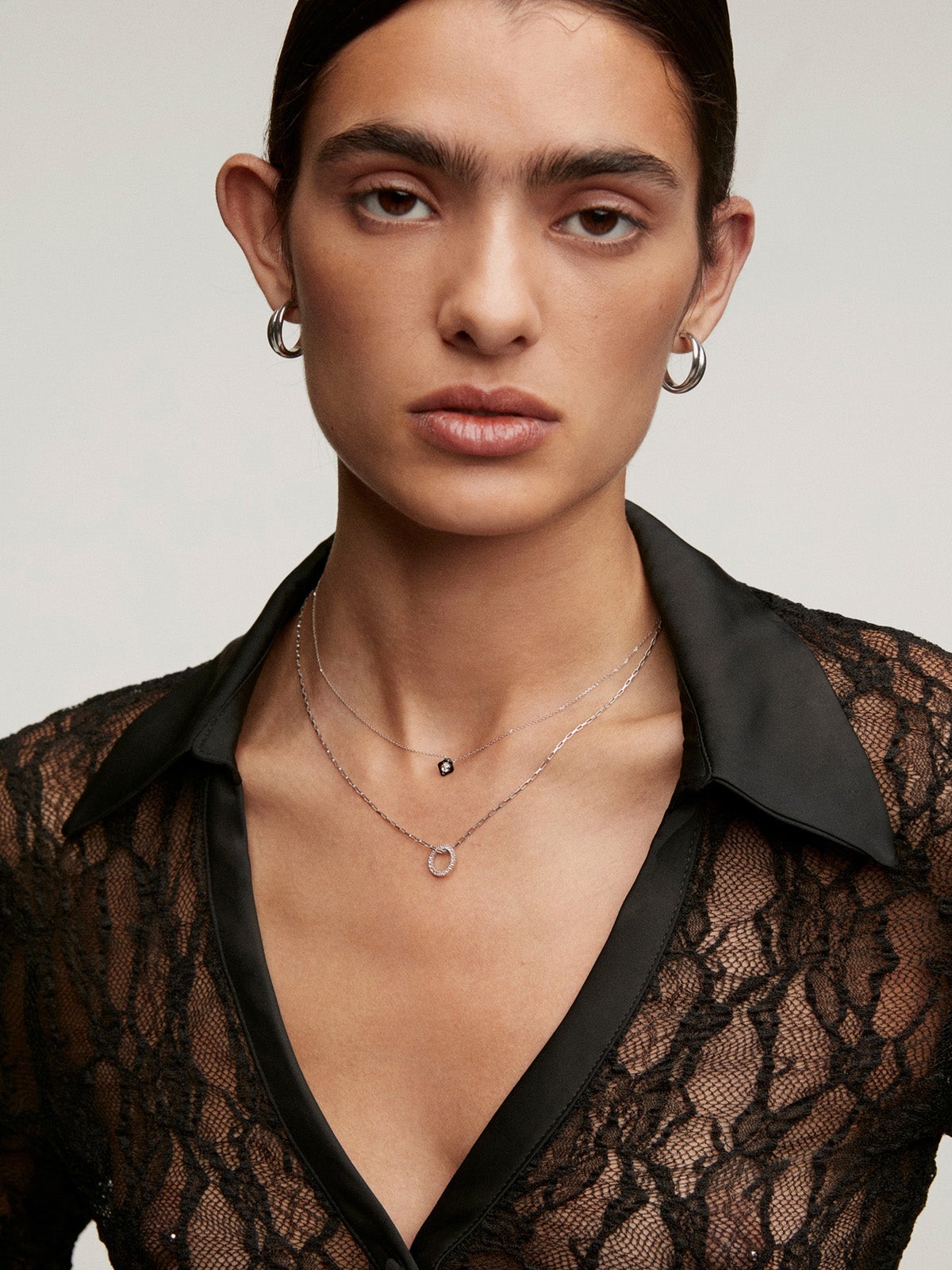 Colgante de plata 925 con círculo de topacios blancos