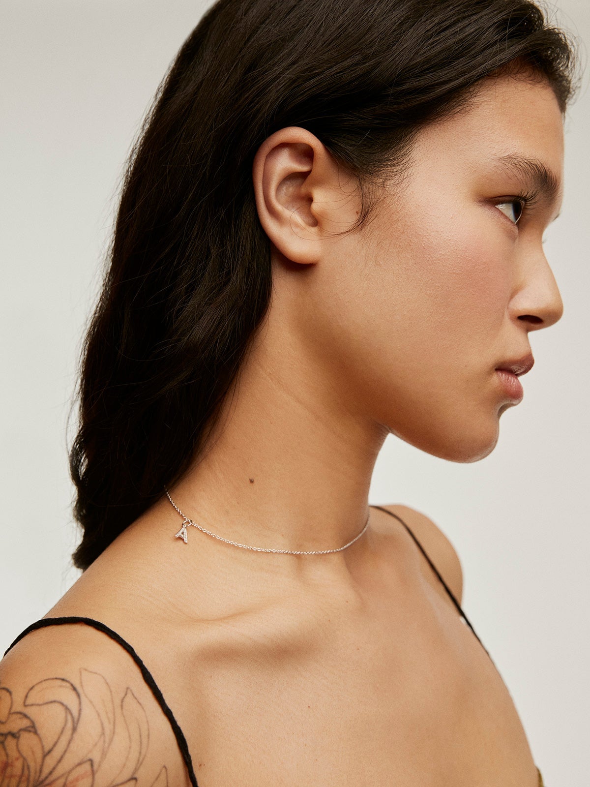 Charm de plata 925 y topacios blancos inicial A