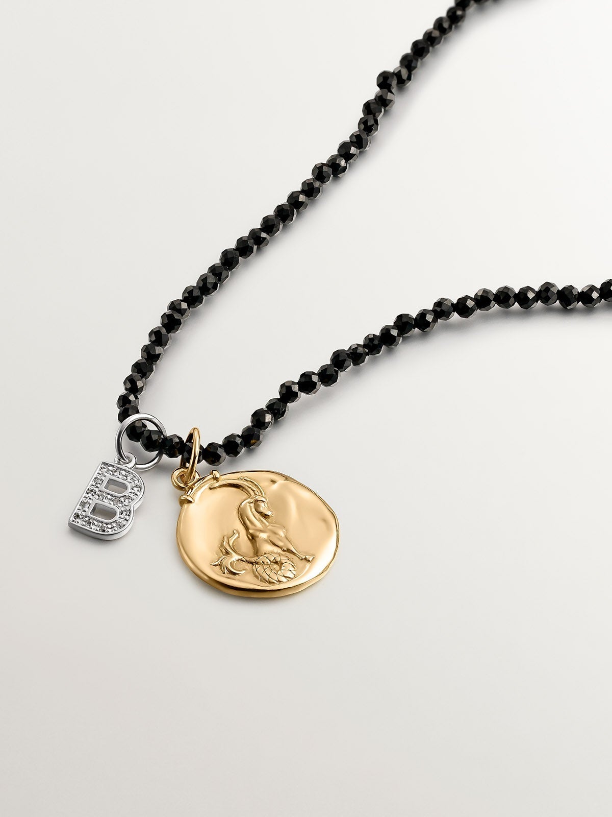 Charm de plata 925 y topacios blancos inicial B