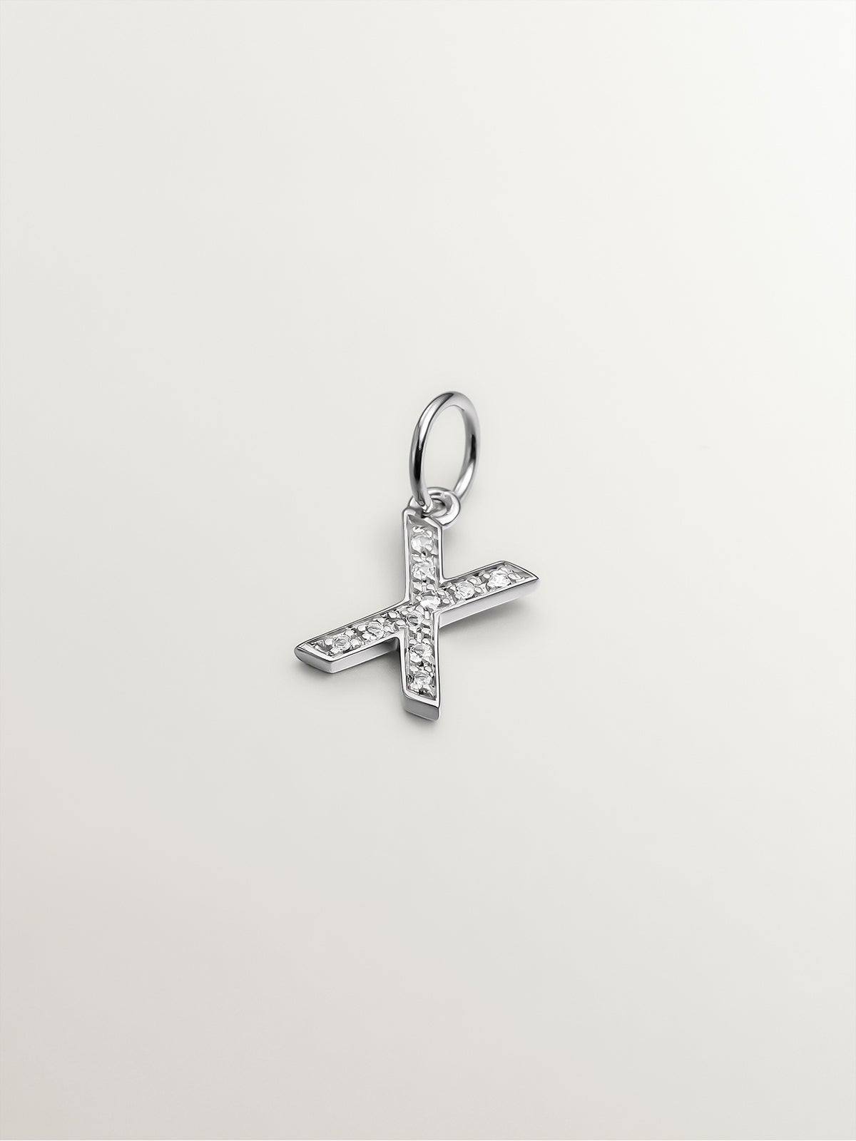 Charm de plata 925 y topacios blancos inicial X
