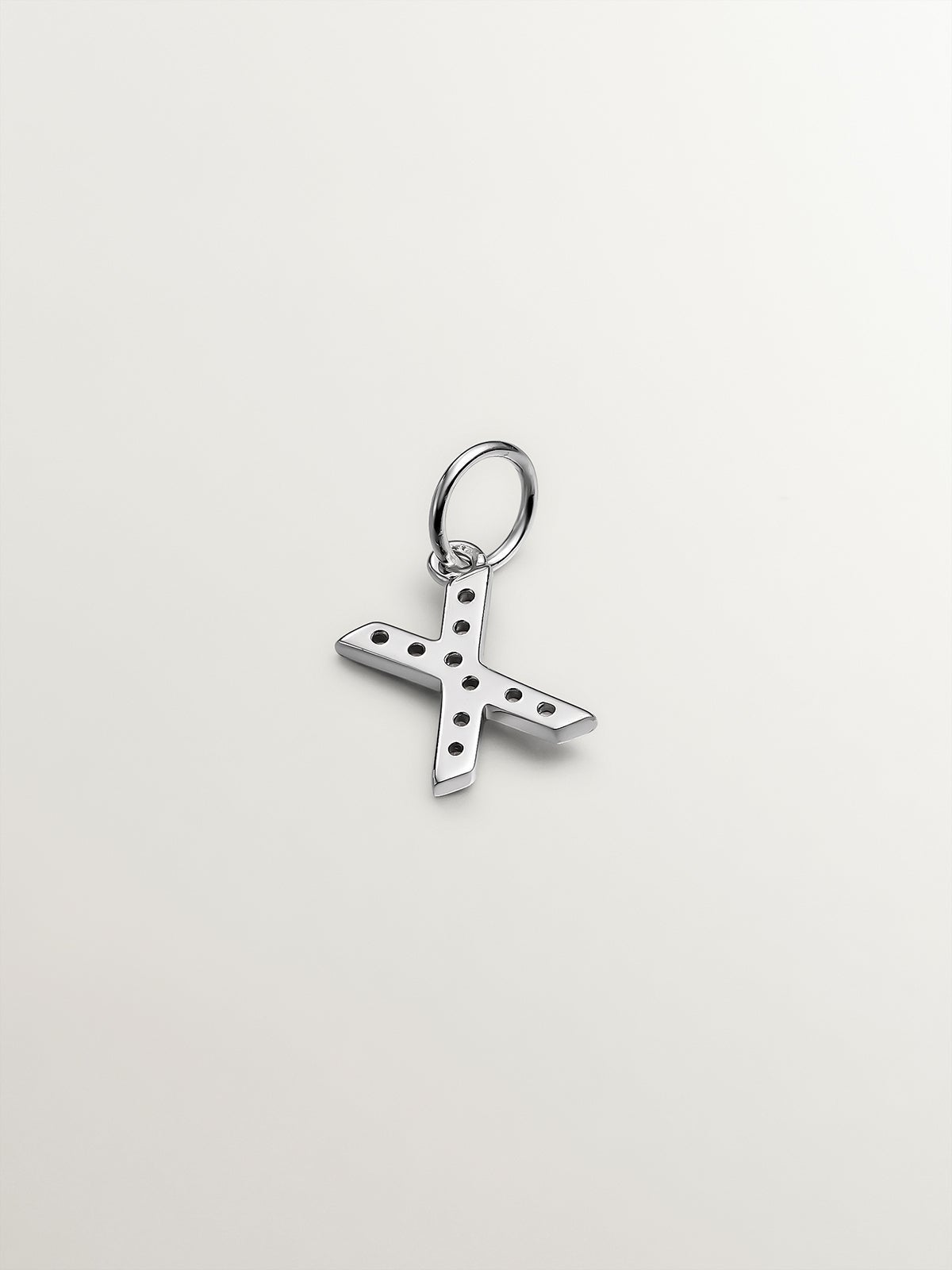 Charm de plata 925 y topacios blancos inicial X
