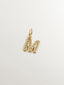Charm de plata 925 bañada en oro amarillo de 18K y topacios blancos inicial M