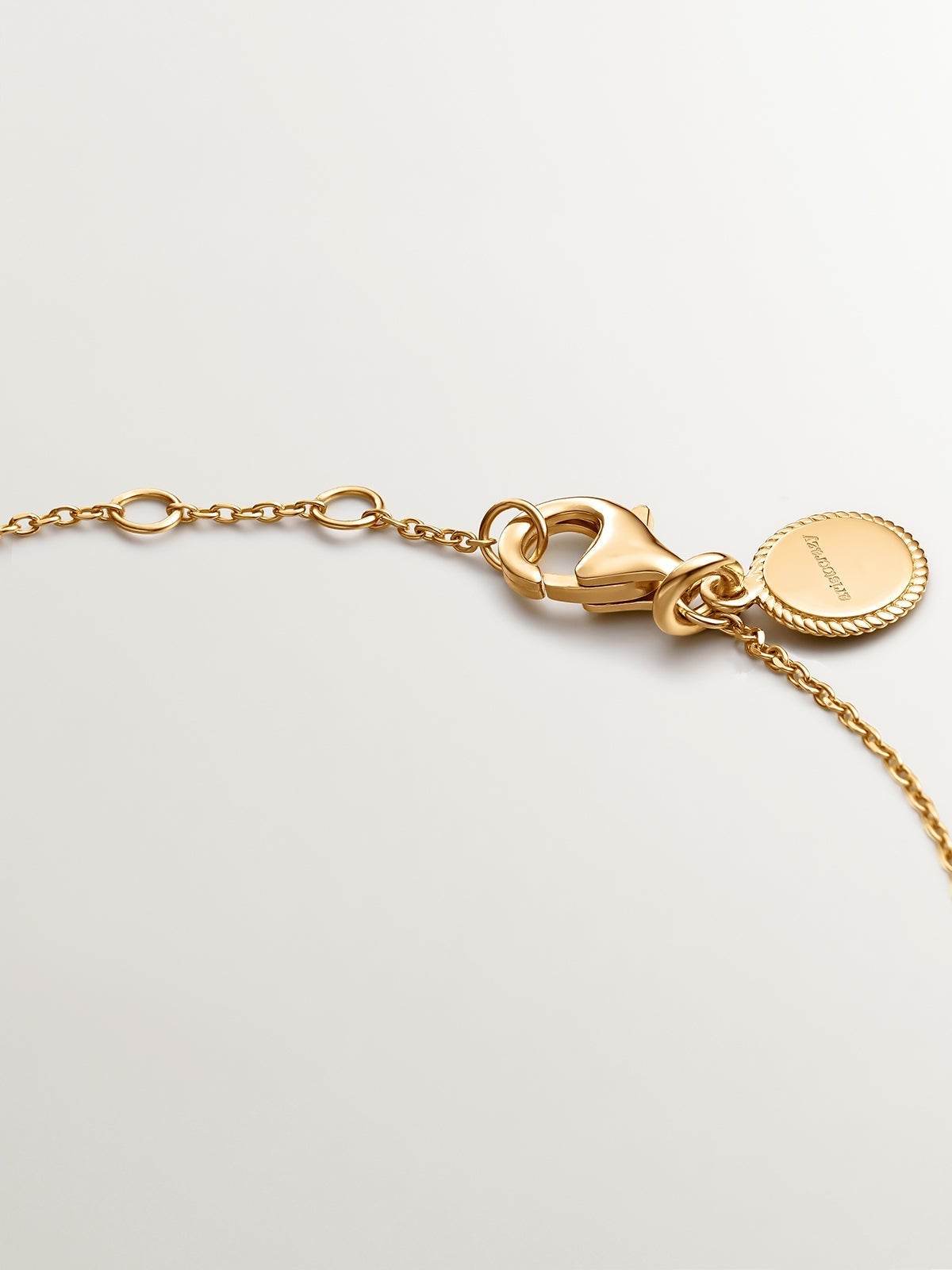 Pulsera de plata 925 bañada en oro amarillo de 18K con topacios azul swiss y blanco