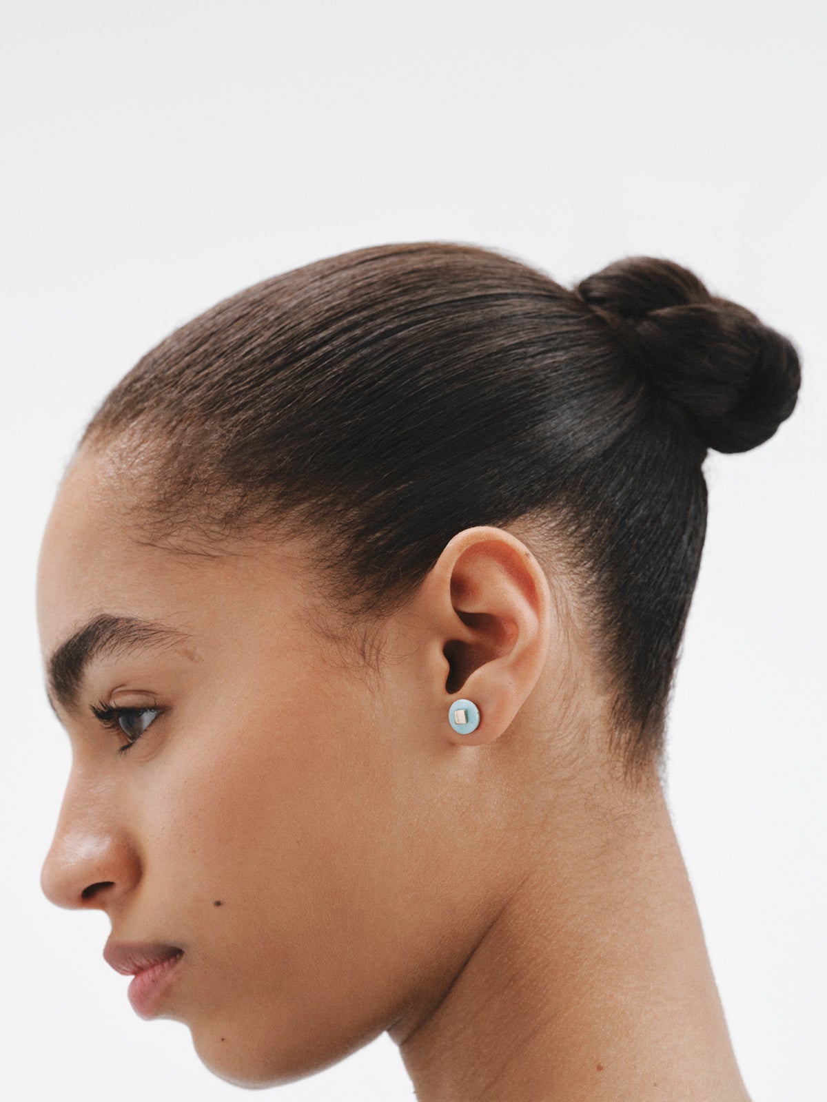 Pendiente individual de oro amarillo de 9K con larimar azul