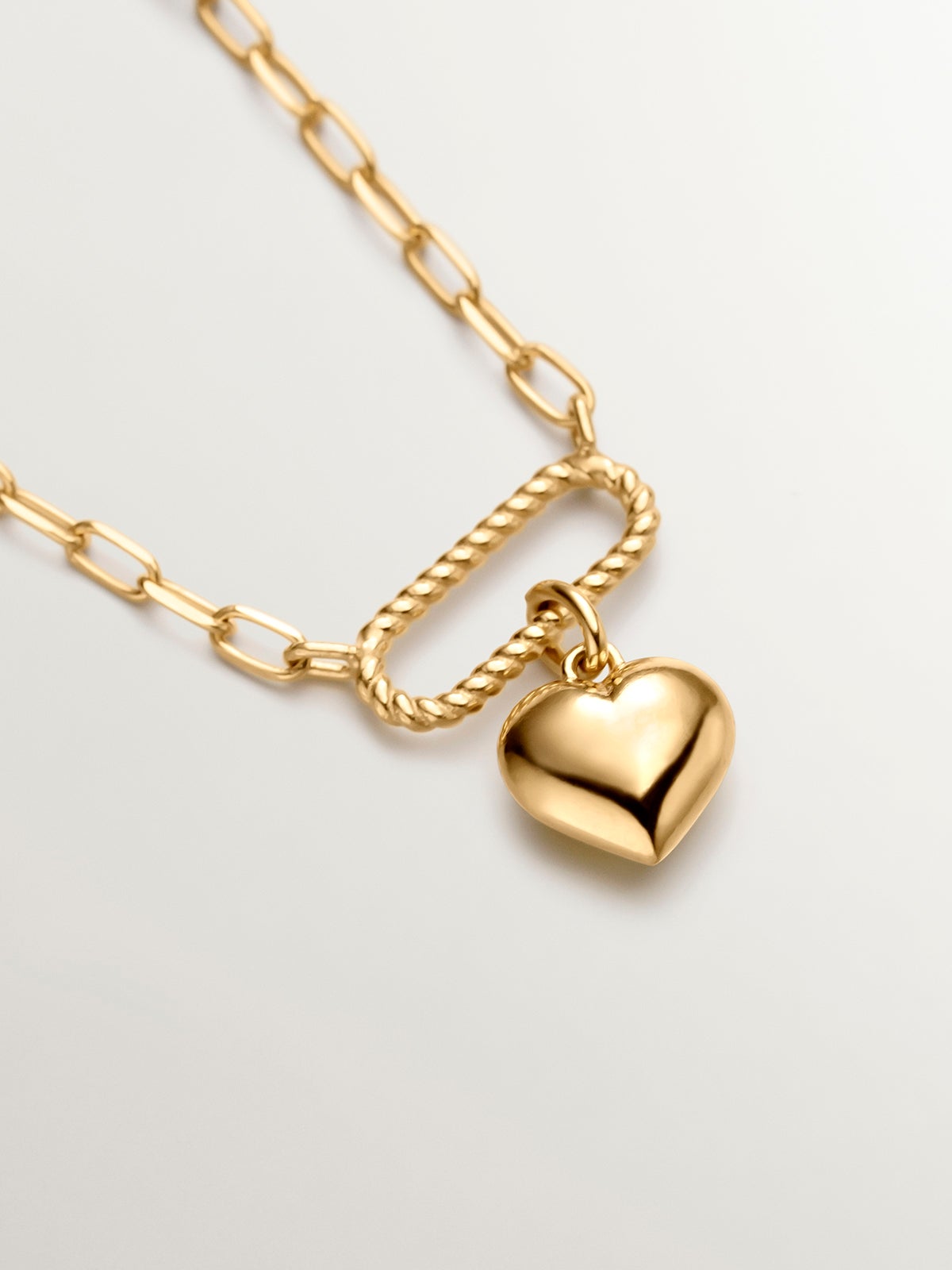 Collar de eslabones forza de plata 925 bañada en oro amarillo de 18K con corazón