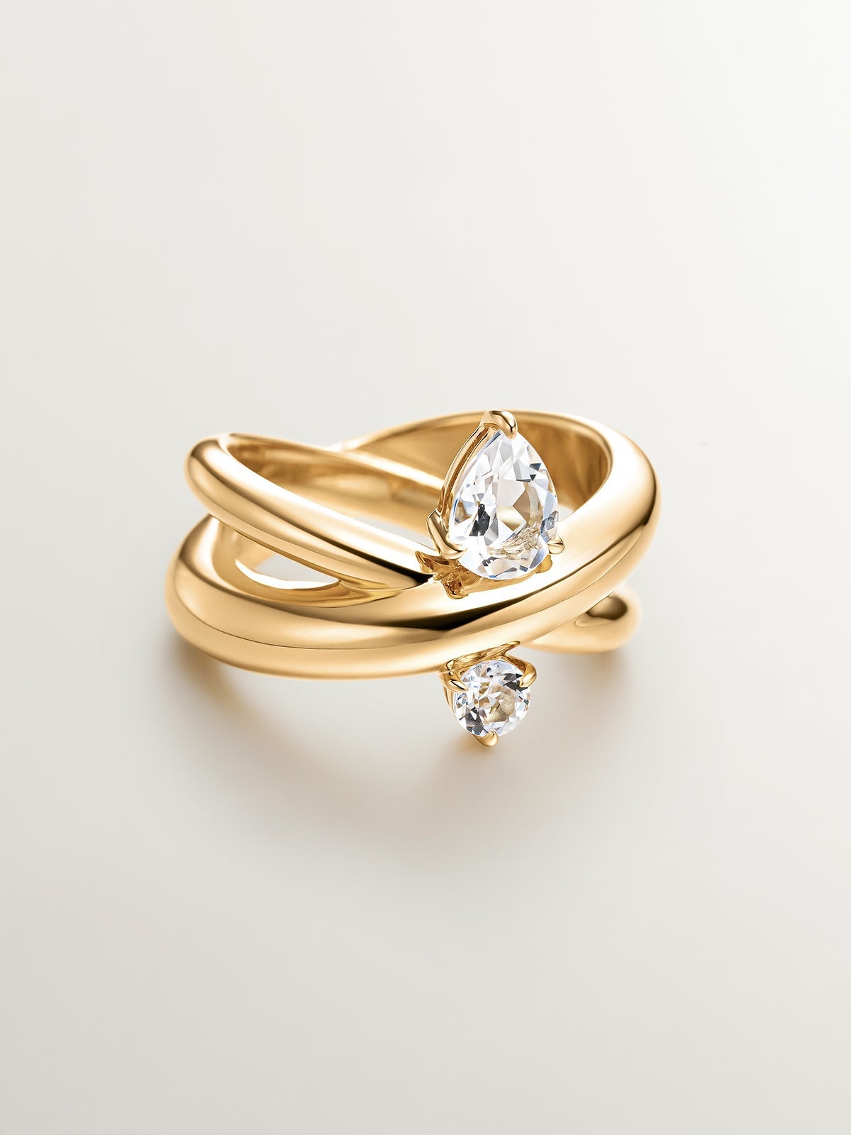 Anillo cruzado de plata 925 con topacios y cuarzos blancos