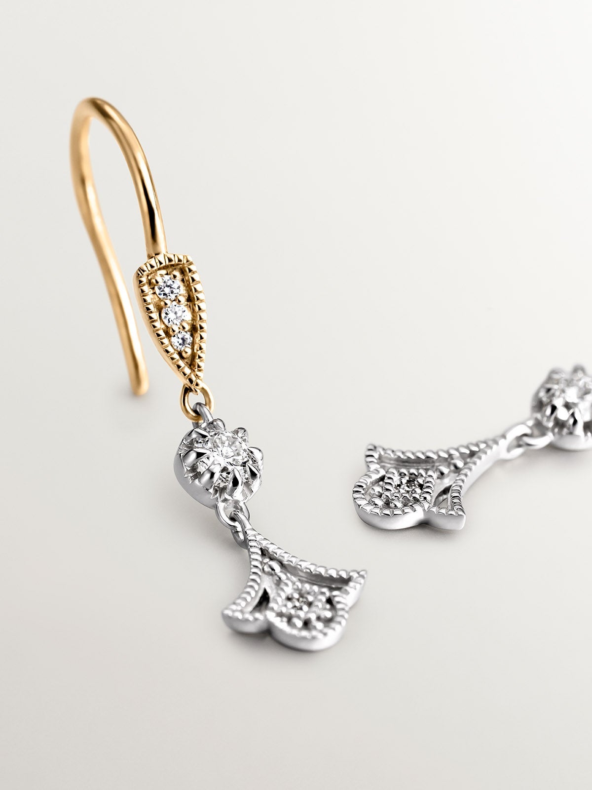 Pendientes de oro blanco y amarillo de 18K con diamantes en talla brillante
