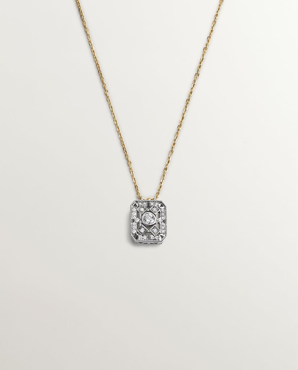 Colgante de oro blanco y amarillo de 18K con diamantes en talla brillante