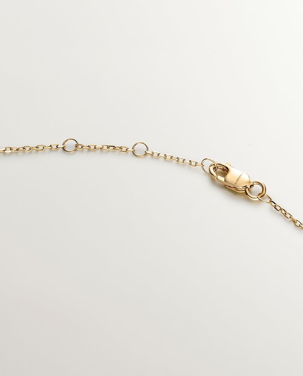 Colgante de oro blanco y amarillo de 18K con diamantes en talla brillante