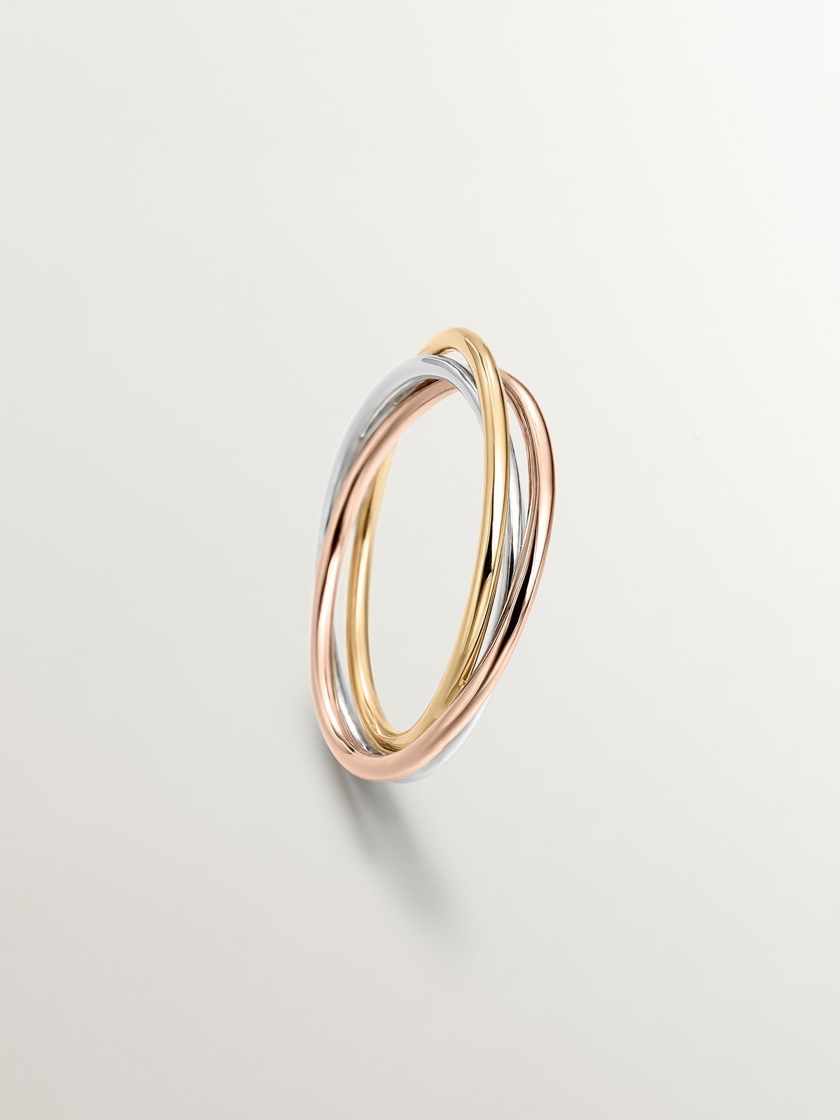 Anillo triple de oro blanco, amarillo y rosa de 9K