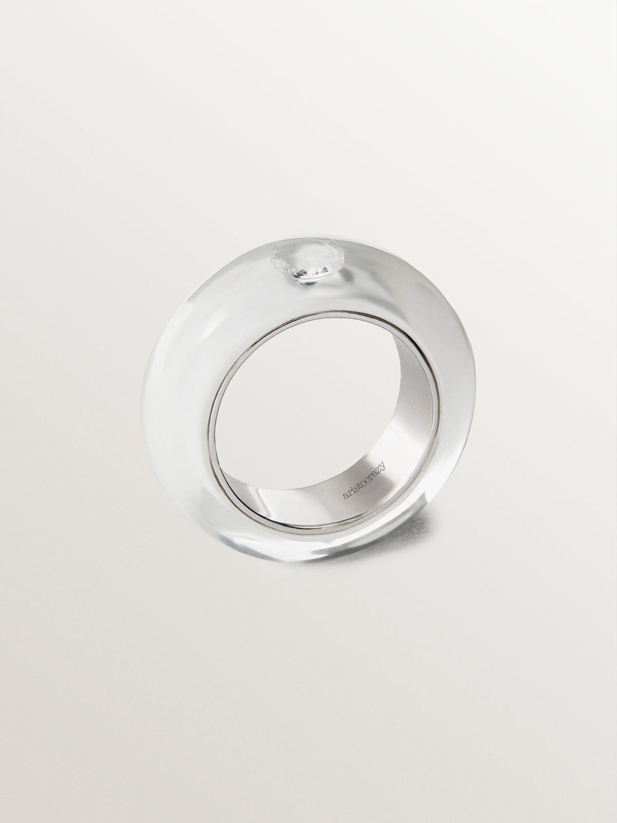 Anillo de plata 925 con esmalte blanco y circón suspendido en resina