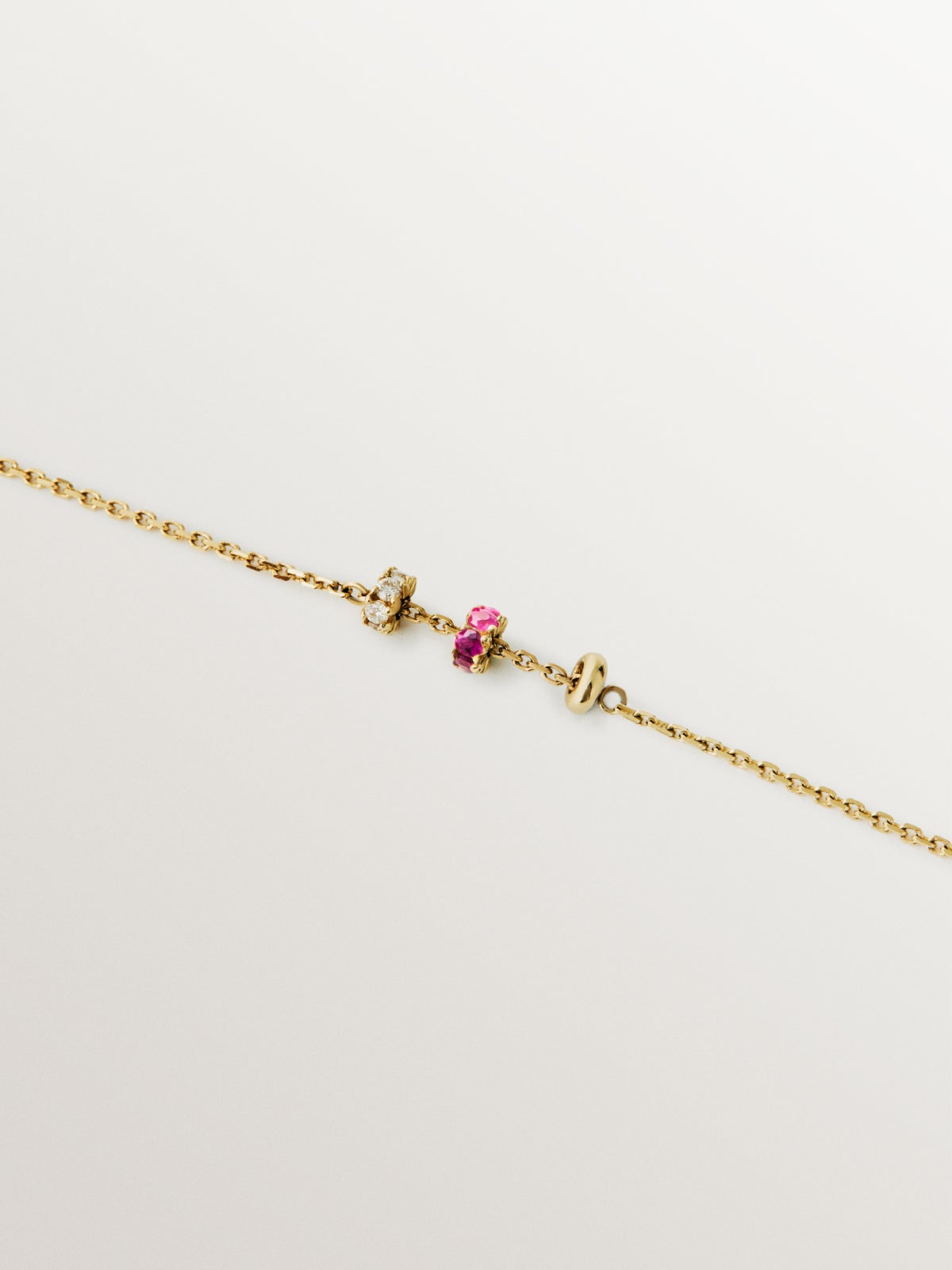 Pulsera de oro amarillo de 9K con rubís y diamantes