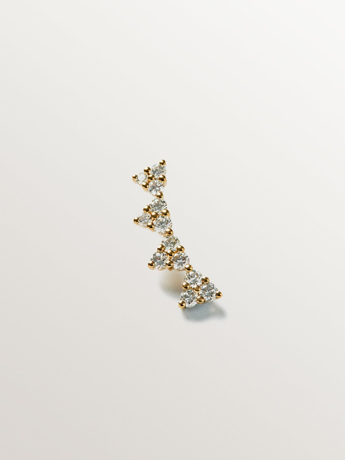 Piercing trepador de oro amarillo de 18K y diamantes en talla brillante